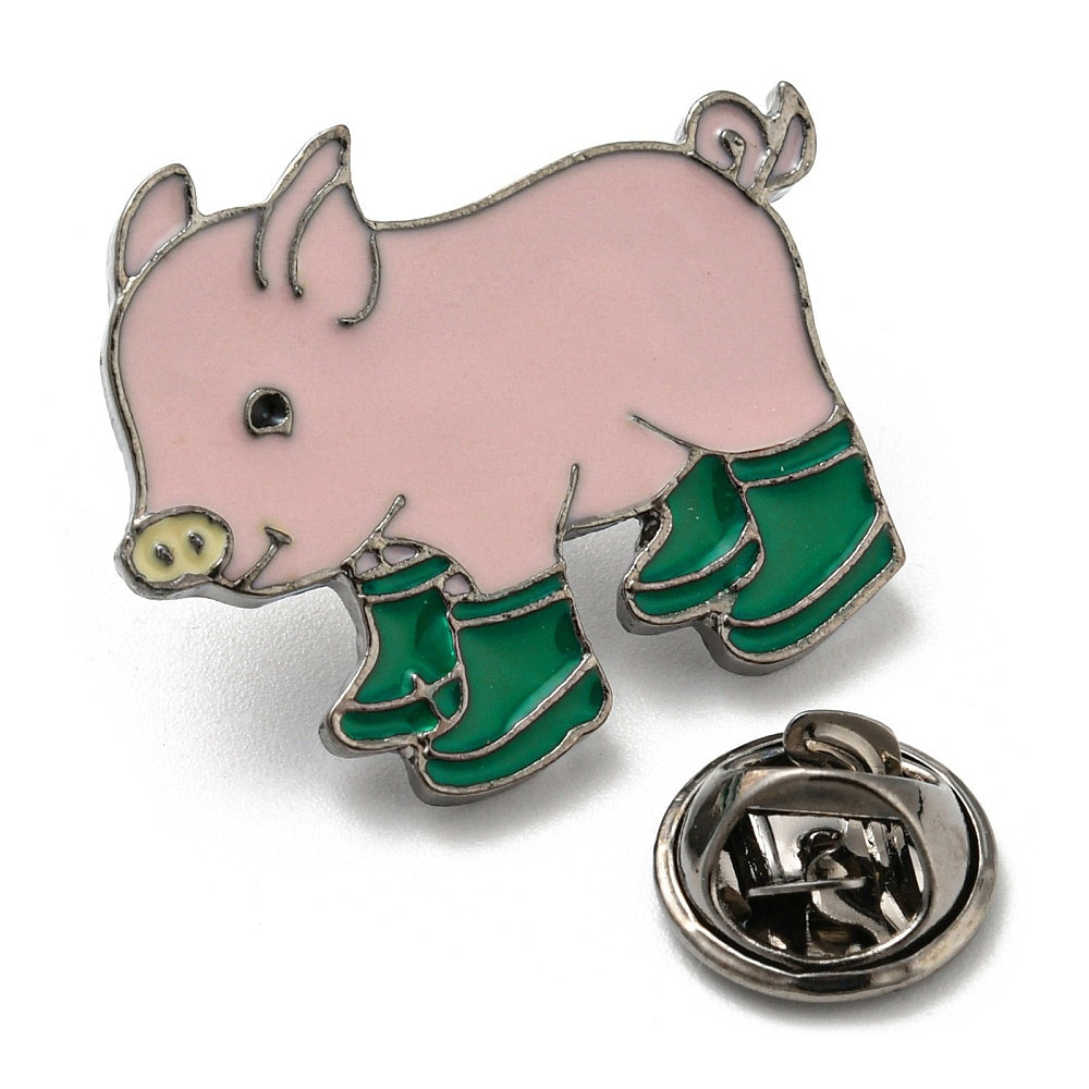 Pink pig wearing green gum boots enamel pin