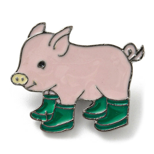 Pink pig wearing green gum boots enamel pin