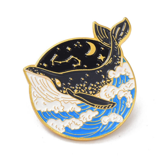 Whale in ocean enamel pin