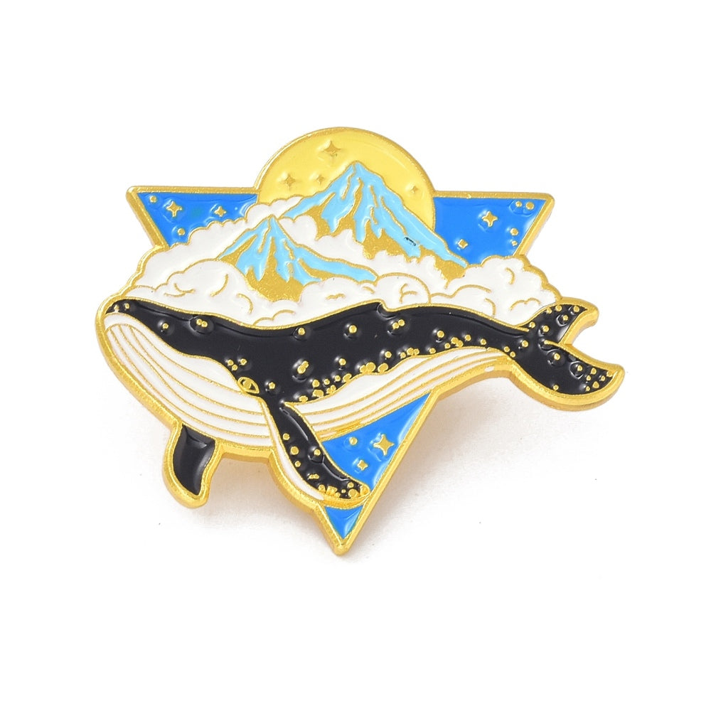 Whale with mountains enamel pin