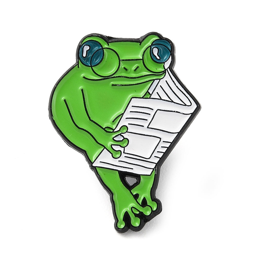 Frog reading a newspaper enamel pin