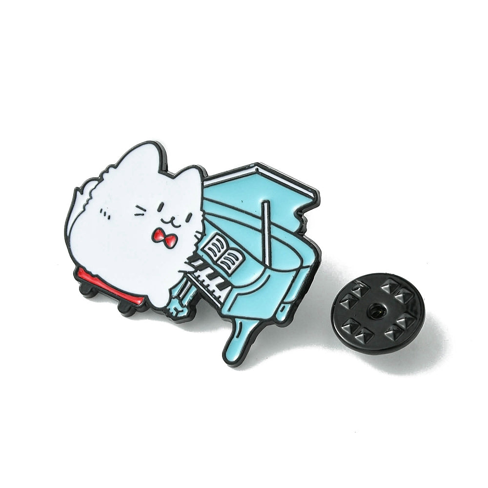 Cat playing piano enamel pin