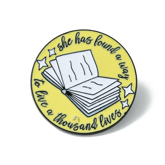 'She has found a way to live a thousand lives' enamel pin