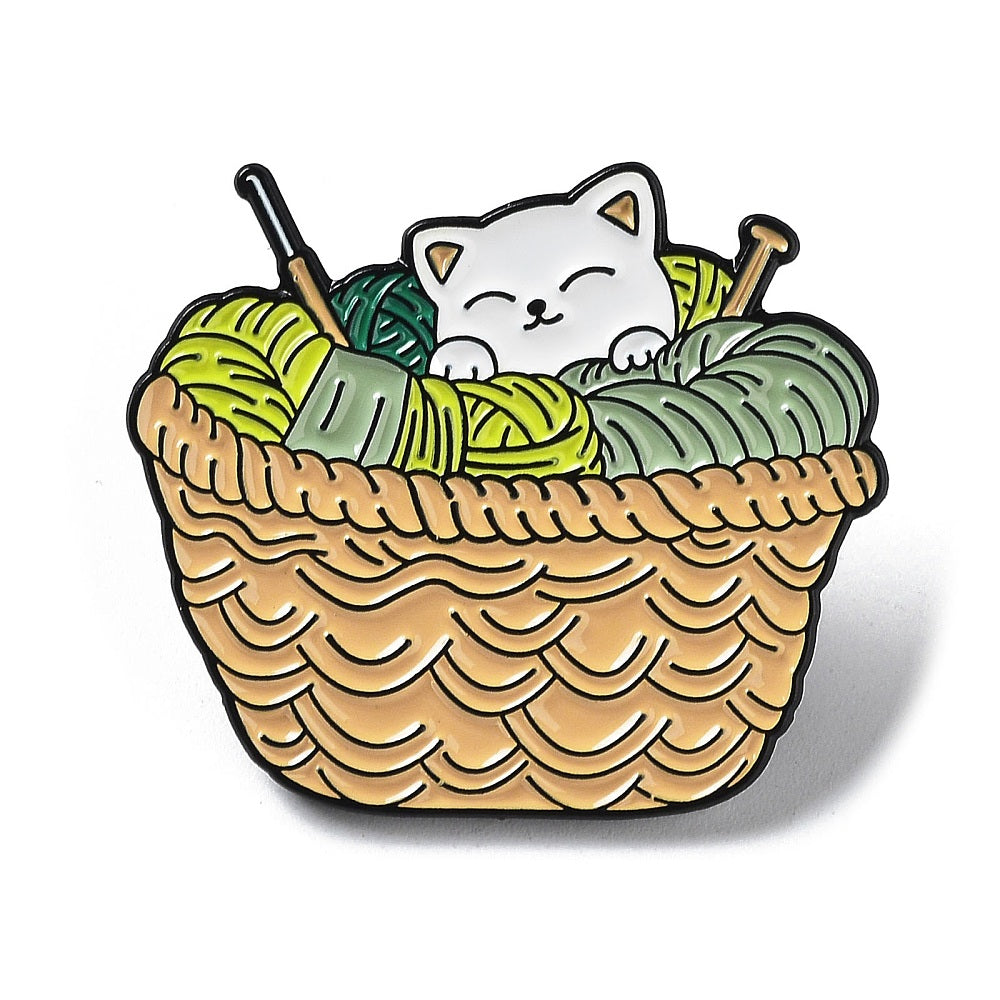 Cat in basket of wool enamel pin