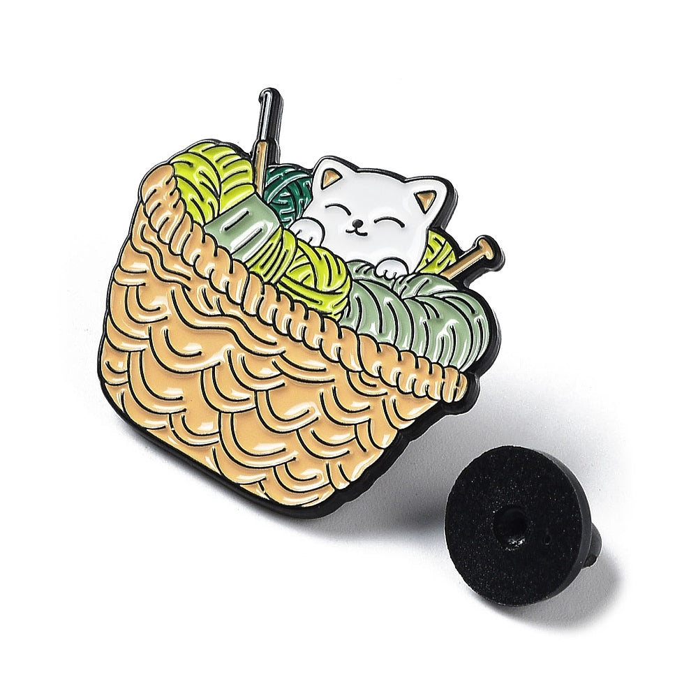 Cat in basket of wool enamel pin