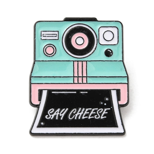 Polaroid camera with 'say cheese' enamel pin