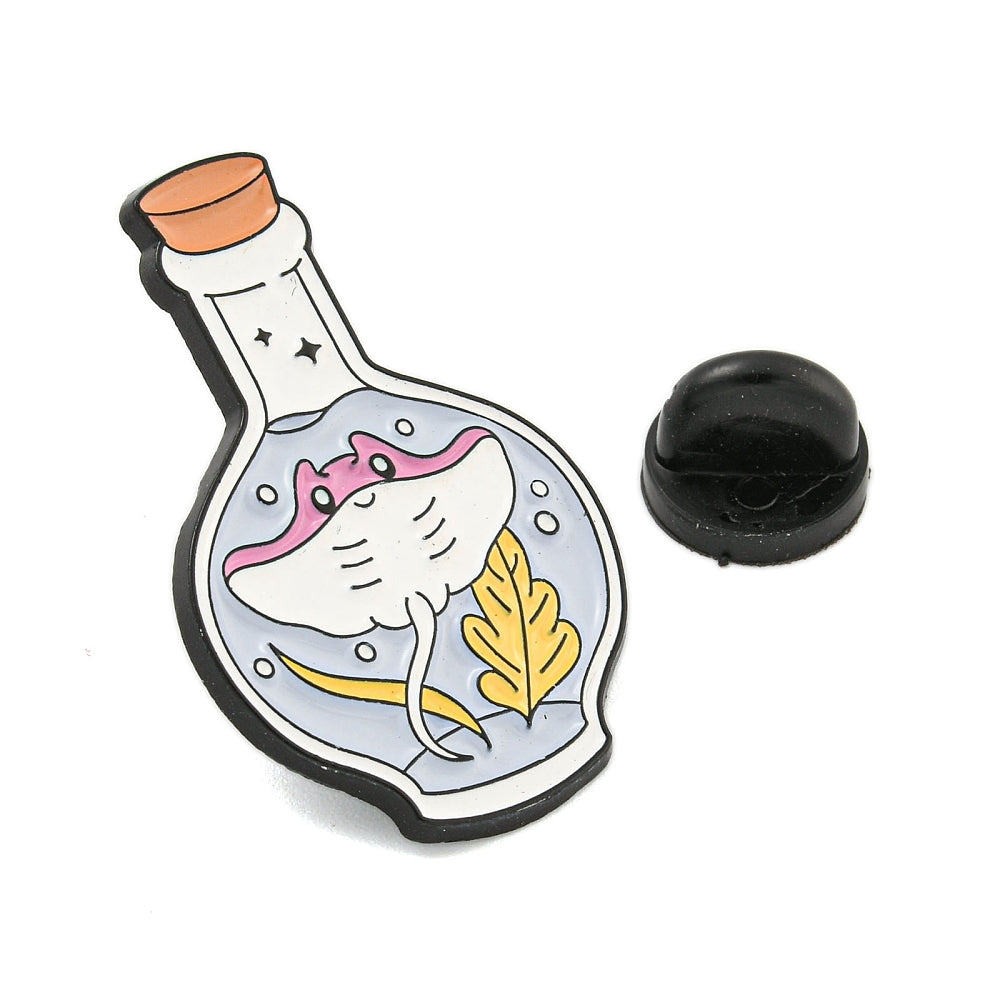 Manta ray in a bottle enamel pin