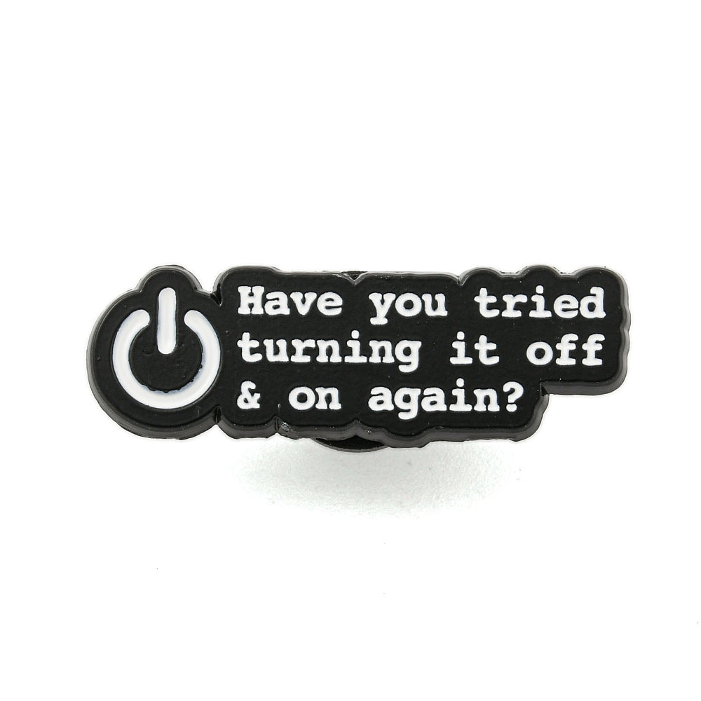 'have you tried turning it off and on again?' enamel pin