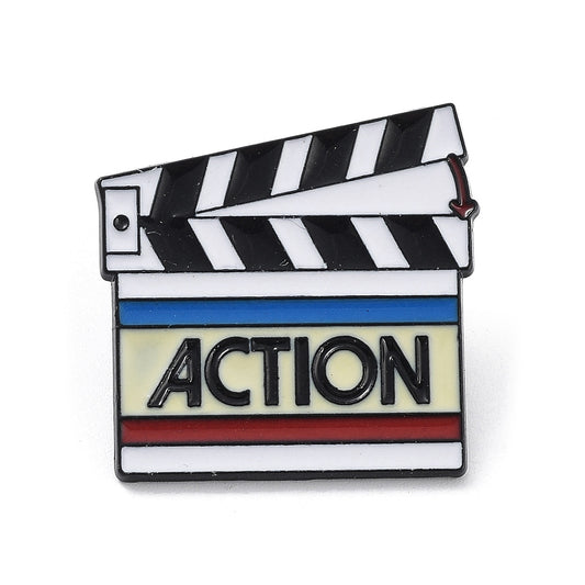 'Action' clapper board enamel pin