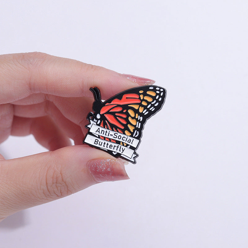 Anti-social butterfly enamel pin