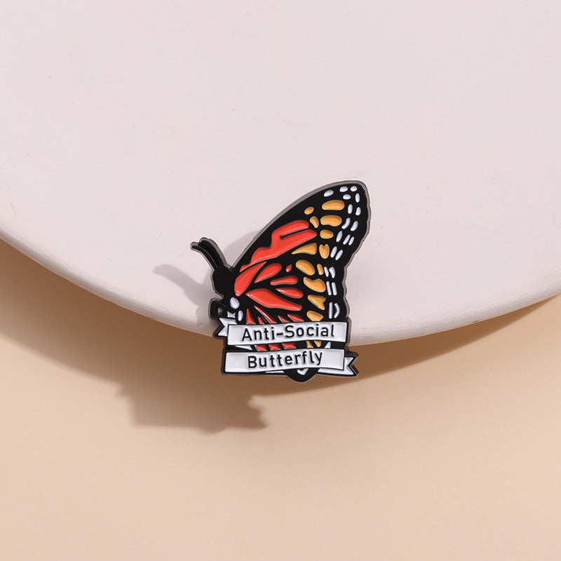 Anti-social butterfly enamel pin