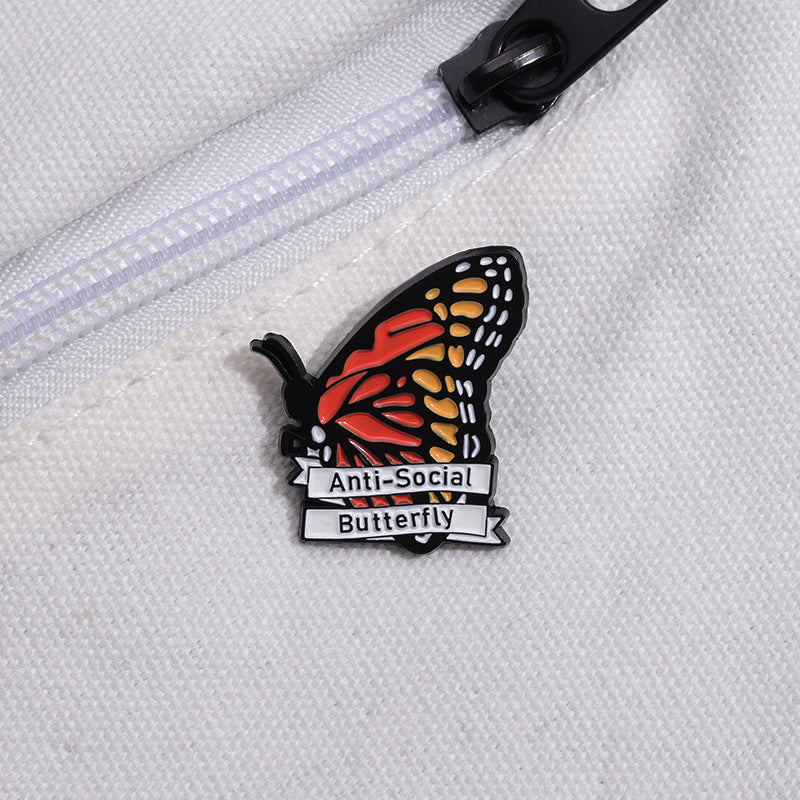 Anti-social butterfly enamel pin