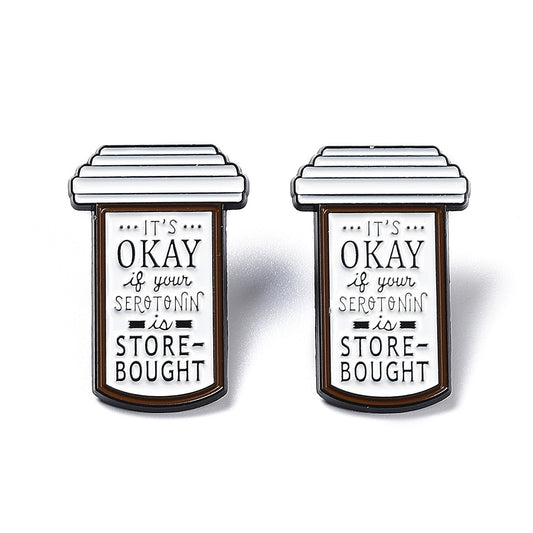 Pill box with 'it's ok if your serotonin is store bought' words enamel pin