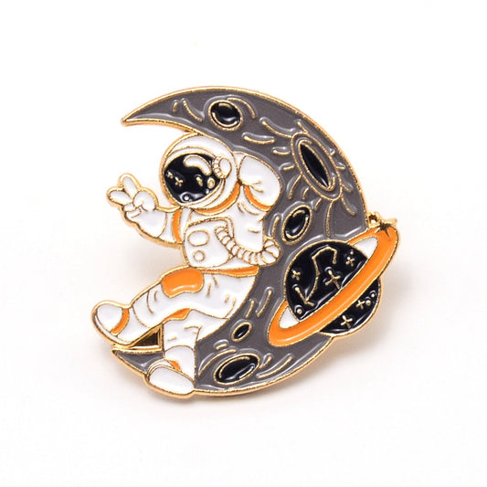 Spacesuit on moon enamel pin