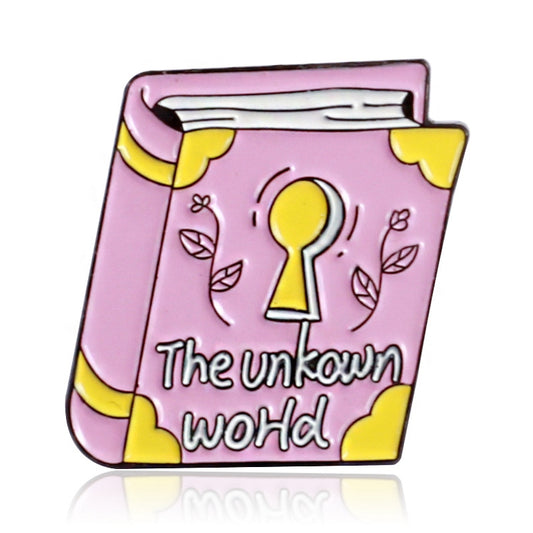 Pink yellow book titles 'the unknown world' enamel pin