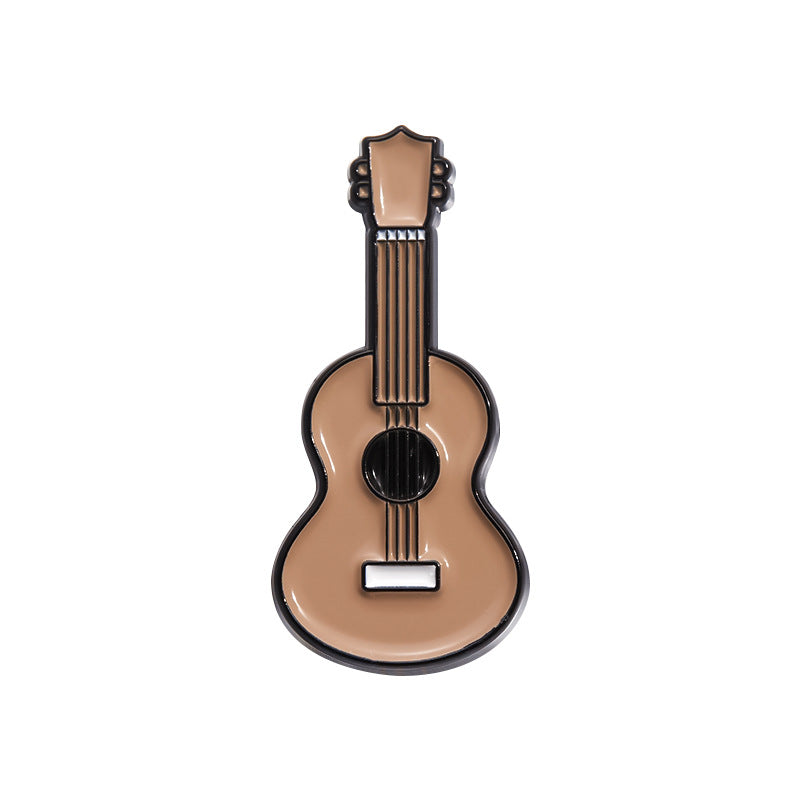 Brown string guitar enamel pin